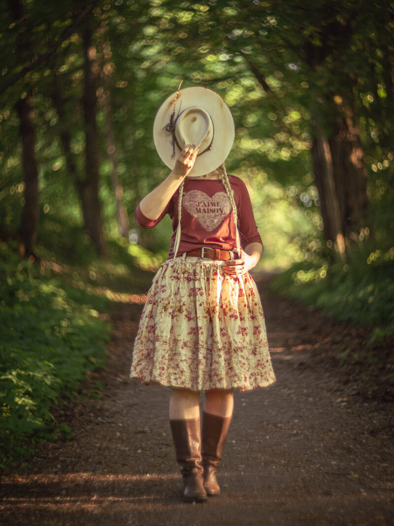 Ewa i Walla Virpa skirt SS23 worn by girl face covered with hat