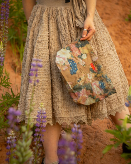 Ewa i Walla Elvy toiletry bag shown on hand